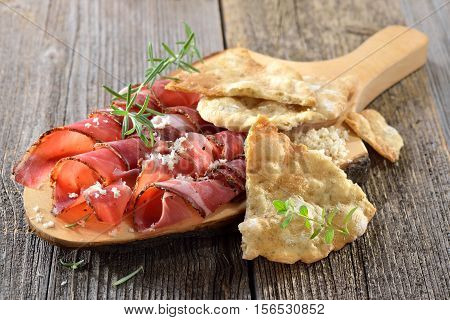South Tyrolean bacon with fresh horseradish and local crispy flatbread