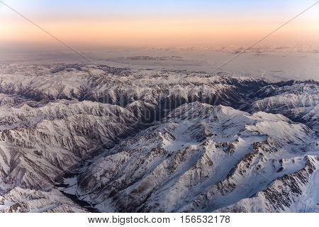 Beautiful View From The Aircraft To The Mountains In Tashkent, China And Kirgistan,
