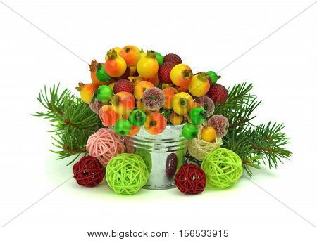 Colored artificial berries and small gifts isolation on a white background. Cute Christmas composition. holiday atmosphere.