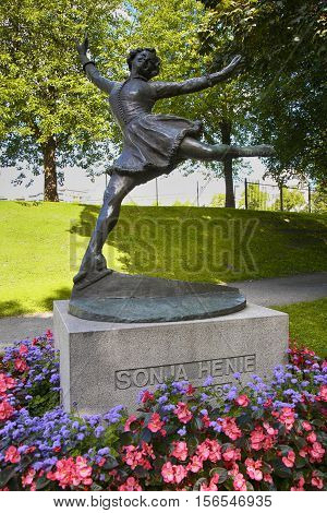 OSLO NORWAY - AUGUST 18 2016: Bronze statue of women skater Sonja Henie she is Norwegian Olympic Ice Skating and Gold Medal Winner located on Vigeland Park in Oslo Norway on August 18 2016.