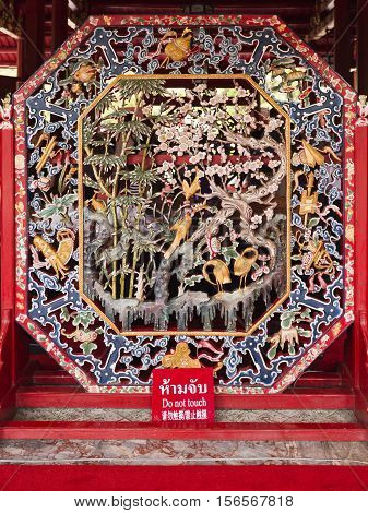 AYUTTHAYA, THAILAND - November 4, 2016: Detail of wood carved decoration inside Phra Thinang Wehart Chamrun the royal mansion at the Bang Pa-In summer palace in Thailand