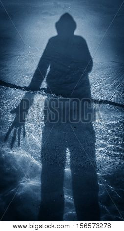 Out of water,Shadow of person reflect in sand and water,**shot with a smartphone