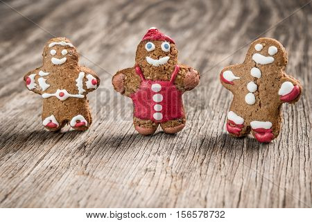 Tree Decorated Gingerman Cookies On Rustic Wooden Background