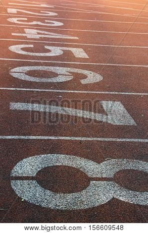 Red running track numbers in the stadium