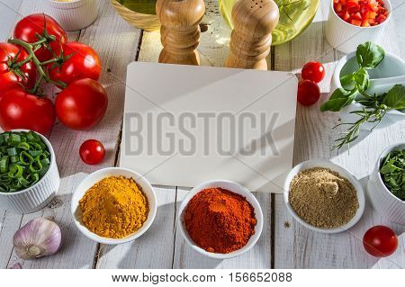 Blank Sheet Of Paper Between The Fresh Vegetables
