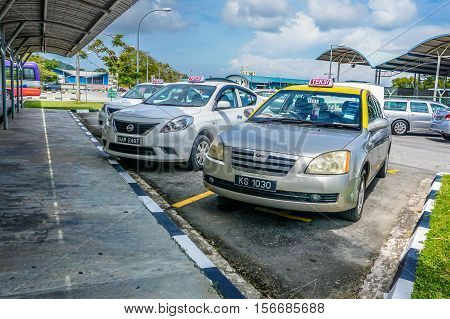 Muara,Brunei-Nov 10,2016:Taxi queued for passengers in Serasa Ferry Terminal at Muara,Brunei Darusallam on 10th Nov 2016.The terminal is about 25km from Bandar Seri Begawan town,Brunei.