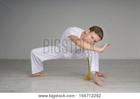 Man practicing capoeira , brazilian martial art.