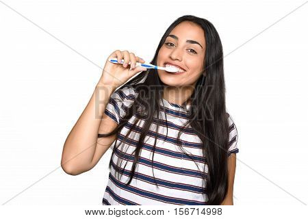 Close-up woman brushing her teeth. Isolated white background.