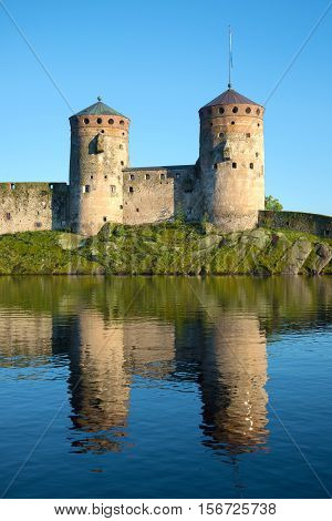 Two old towers of the medieval fortress Olavinlinna closeup. Savonlinna, Finland