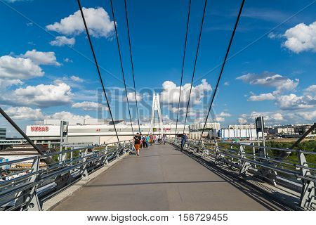 Krasnogorsk, Russia - July 09.2016 People go on the cable-stayed pedestrian bridge.