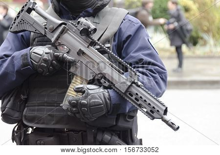 Paris France - November 13 2016: Policeman protecting the tribute to the victims of the attacks at the Bataclan the november 13th 2015