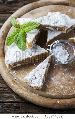 Traditional italian dessert panforte with nut selective focus
