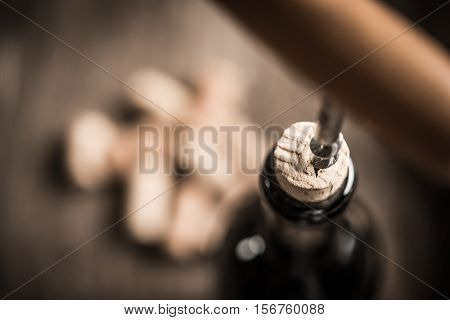 Cork Screw And Wine Bottleopening A Wine Bottle With A Corkscrew In A Restaurant