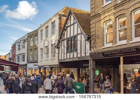 Winchester, UK. November 13th 2016. Tourists and shoppers walking through the central streets in Winchester.