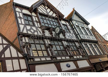 Winchester, UK. November 13th 2016. An iconic building in the centre of Winchester with the ground floor shop currently occupied by Boots.