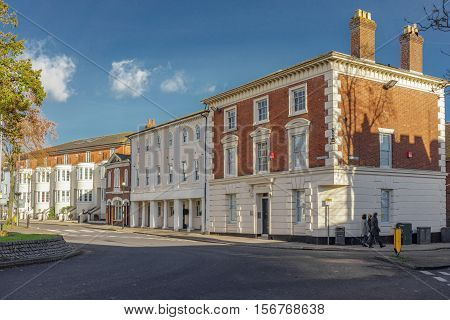 Winchester, UK. November 13th 2016. Homes and old buildings by the King Alfred statue roundabout in Winchester.