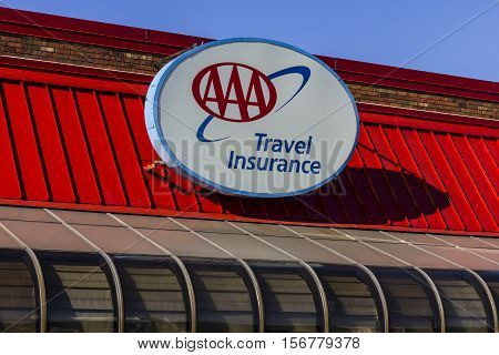 Kokomo - Circa November 2016: AAA Travel & Insurance Sign. The American Automobile Association Provides Roadside Assistance Jump Starts and Discounts to its Members III