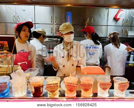 People Selling Fruit Jiuce At Night Market