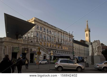 VIENNA, AUSTRIA - DECEMBER 31 2015: view from the street of Albertina museum in Vienna with people and cars parked on the street