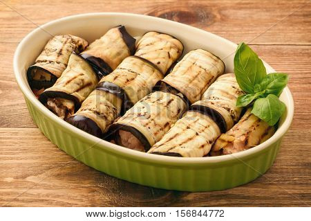 Casserole with roasted eggplants stuffed with minced meat.