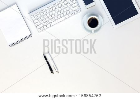 Responsive Design Mockup High Technology Composition Top View Gadgets Keyboard Notepad Pen Coffee Mug on unusual white Table