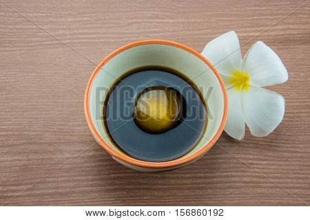 Raw Egg in soy sauce and Plumeria flower,Tamago kake gohan