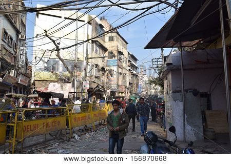 NEW DELHI, INDIA, FEBRUARY 02, 2016 - Unidentified indian people and old buildings in Chandni Chowk, the old part of the city