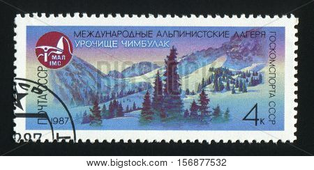 USSR - CIRCA 1987: A post stamp printed in USSR shows image of mountains Chimbulak in USSR circa 1987
