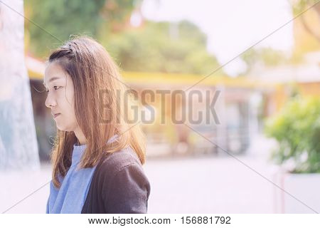 Young Hipster Woman, Chinese Women In Thiking Someting At The Prak With Fresh Air.