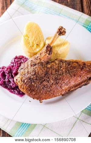 Portion Of Duck Breast With Cabbage And Crispy Skin And Dumplings