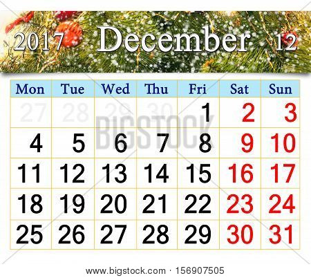 beautiful calendar for December 2017 with the ribbon of New-Year tree. Beautiful reminder for December 2017