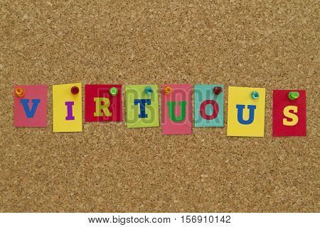 VIRTUOUS word written on colorful sticky notes pinned on cork board.