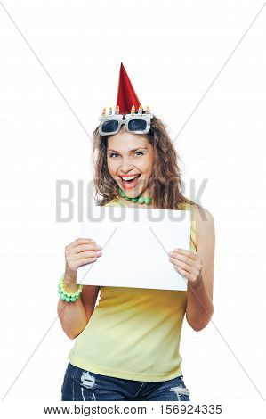 Beautiful woman with red cap on her head , in her birthday pointing at blank Board