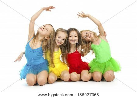 Group of little beautiful ballet dancers isolated on white