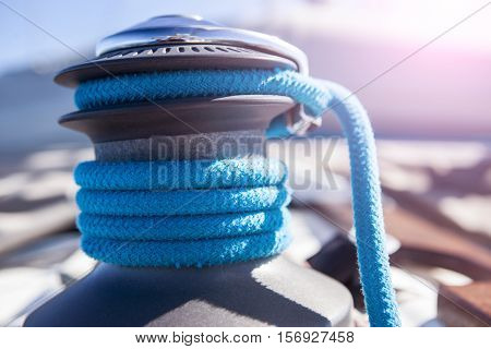 Winch with blue rope on a yacht
