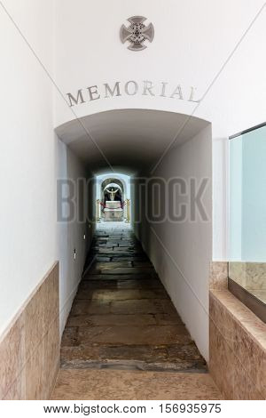 Lisbon, Portugal. October 31, 2016: Entrance of the Memorial with a tomb containing a fallen unknown soldier, in the Chapel of the Monumento aos Combatentes do Ultramar - Ultramar Combatants Monument