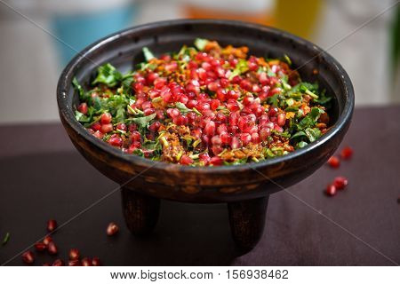 Kuchmachi - traditional Georgian dish of offal with grains of pomegranate