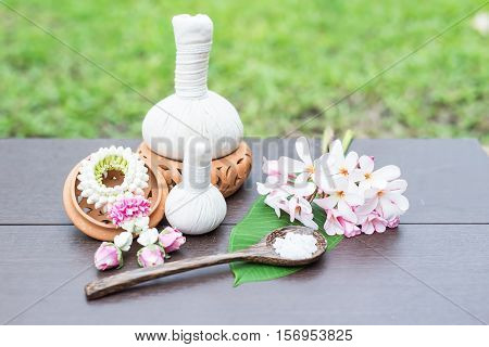 Spa massage compress balls herbal ball on the wooden with treaments spa Thailand select focus