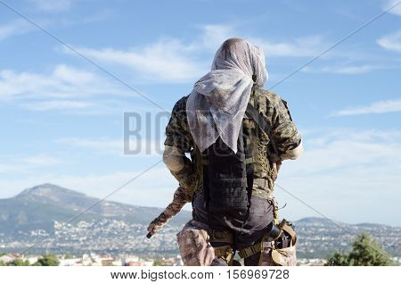 sniper recon target scope multicam ghillie suit, back view