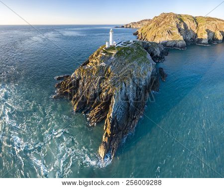 Aerial View Of The Beautiful Cliffs Close To The Historic South Stack Lighthouse On Anglesey - Wales