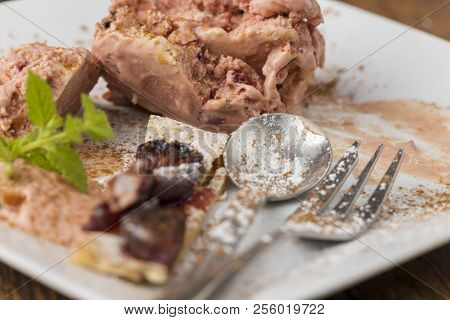 Plum Ice Cream And Bavarian Zwetschgendatschi On A Plate