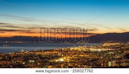 Genoa (genova), Italy, March  10, 2017 - Aerial View Of The City Of Genoa (genova) At Dusk.