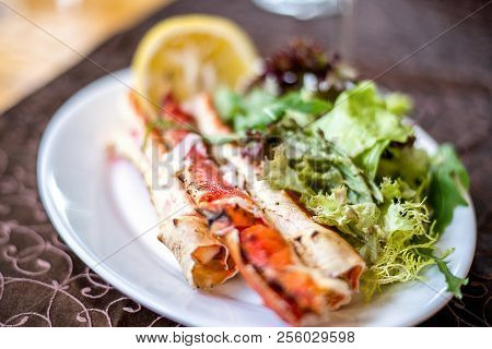 Claws Of King Crab, Lemon And Salad