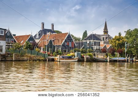 Zaanse Schans, Netherlands, August 19, 2015 - Traditional Dutch Houses And Boats At The Canal.