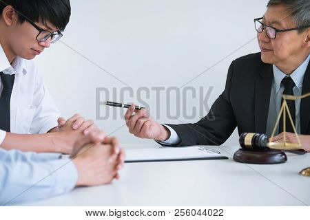 Unhappy Divorce Couple Having Conflict, Husband And Wife During Divorce Process With Senior Male Law