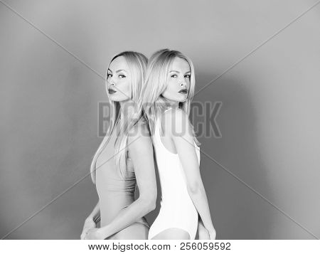 Siamese Or Conjoined Twins, Pretty Girls And Sexy Women In Erotic White And Yellow Bodysuits. Young,