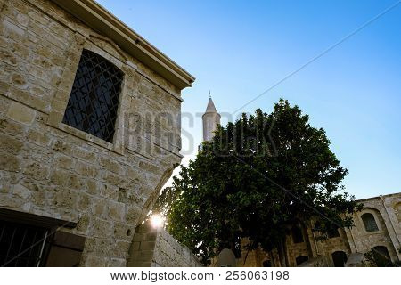Buyuk Cami Mosque In Larnaca Against Blue Sky