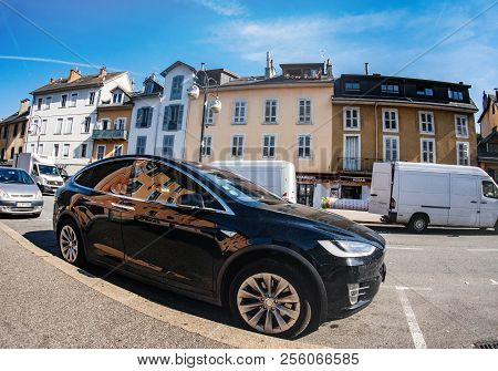 Chambery, France - Circa 2018: Front View Luxury Tesla Model X Electric Car Suv Parked On French Str