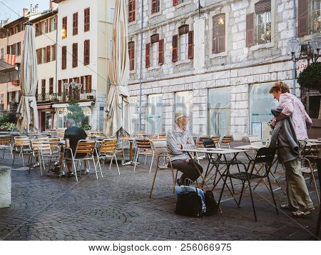 Chambery, France - Aug 16, 2018: Senior Women At The Outdoor Cafe In Central Chambery Early In The M