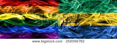 Gay Vs Gabon Smoke Flags Placed Side By Side. Thick Colored Silky Smoke Flags Of Gay And Gabon